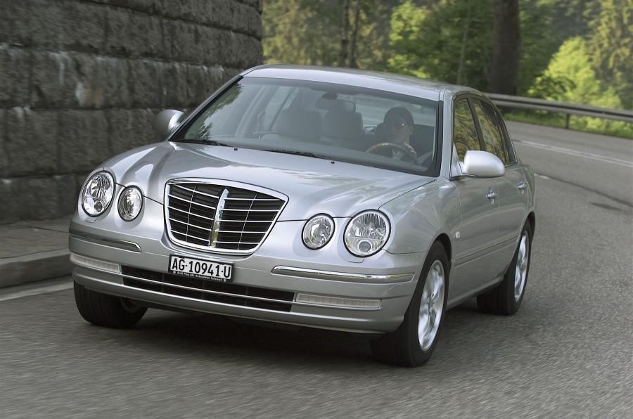  Kia Opirus 2003 года  (фото 51 из 54)